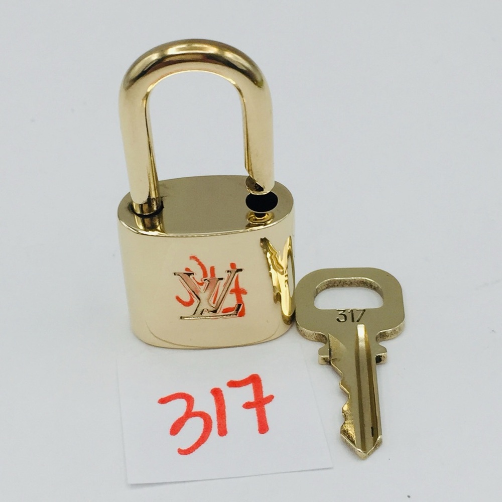 Authentic Louis Vuitton padlock/ lock and key set #317